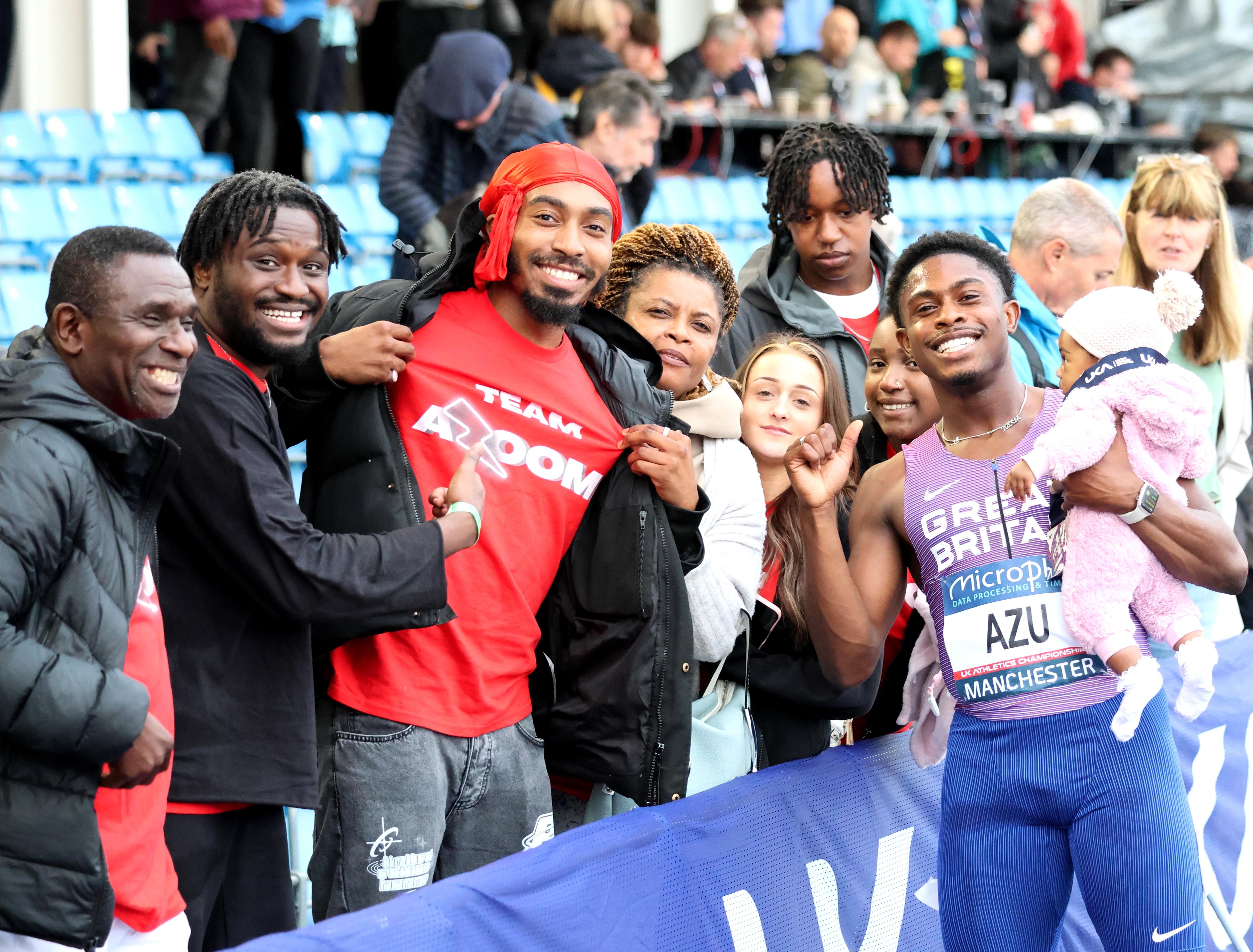 Jeremiah Azu celebrates his silver medal and booking his spot at the Paris Olympics.